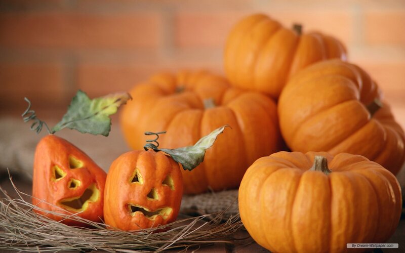 Carved Pumpkins on Hay