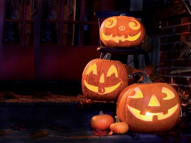 Carved Pumpkins on Porch — Orange, Festive, Night