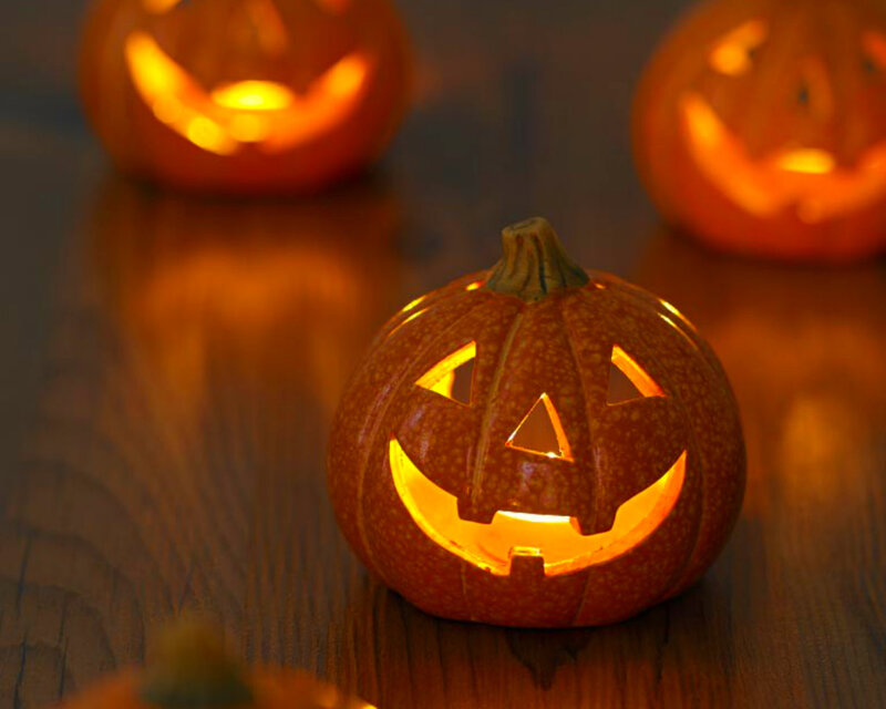 Carved Pumpkins on Wood — Orange, Festive