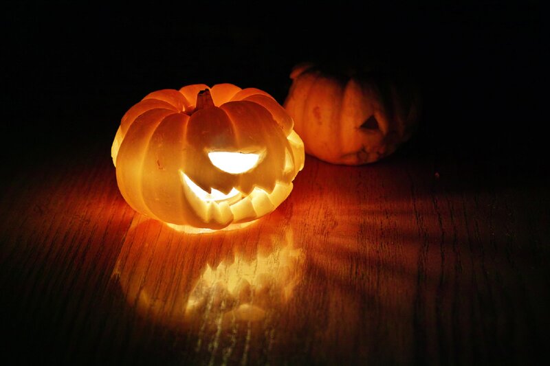 Carved Pumpkins on Wood
