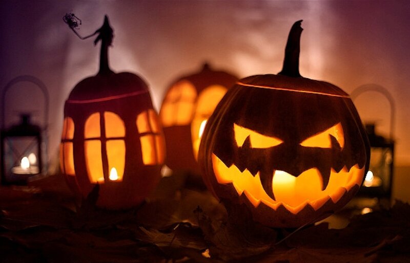 Carved Pumpkins with Candles — Orange