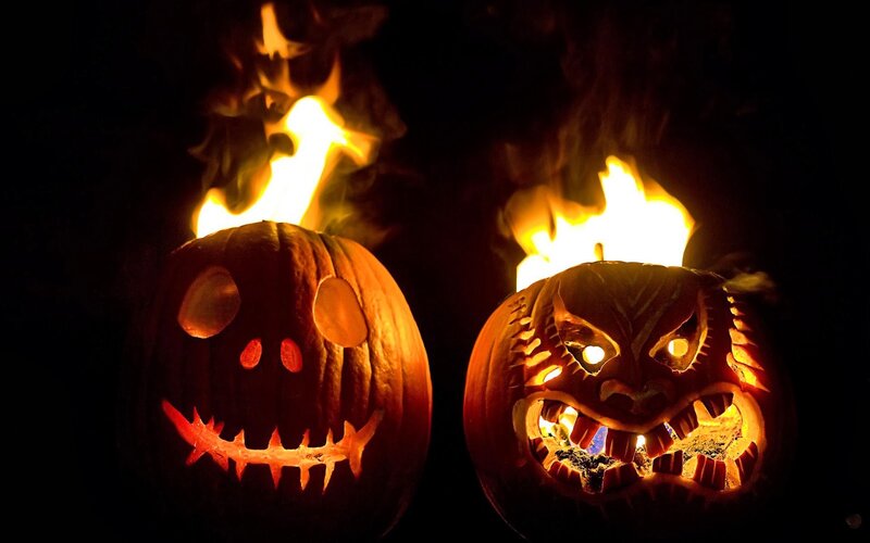 Carved Pumpkins with Flames — Orange, Dramatic, Night