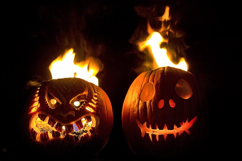 Carved pumpkins with flames