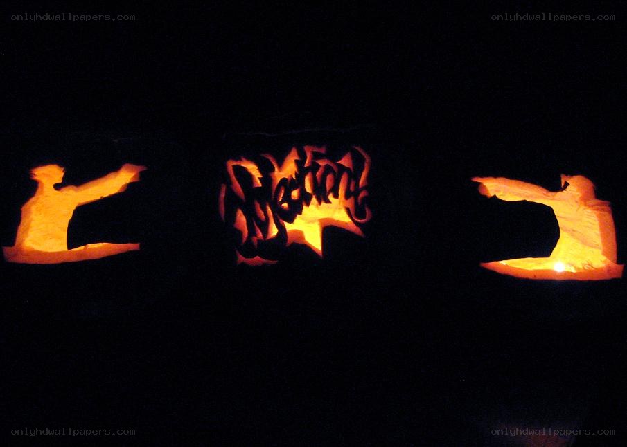 carved pumpkins with silhouettes