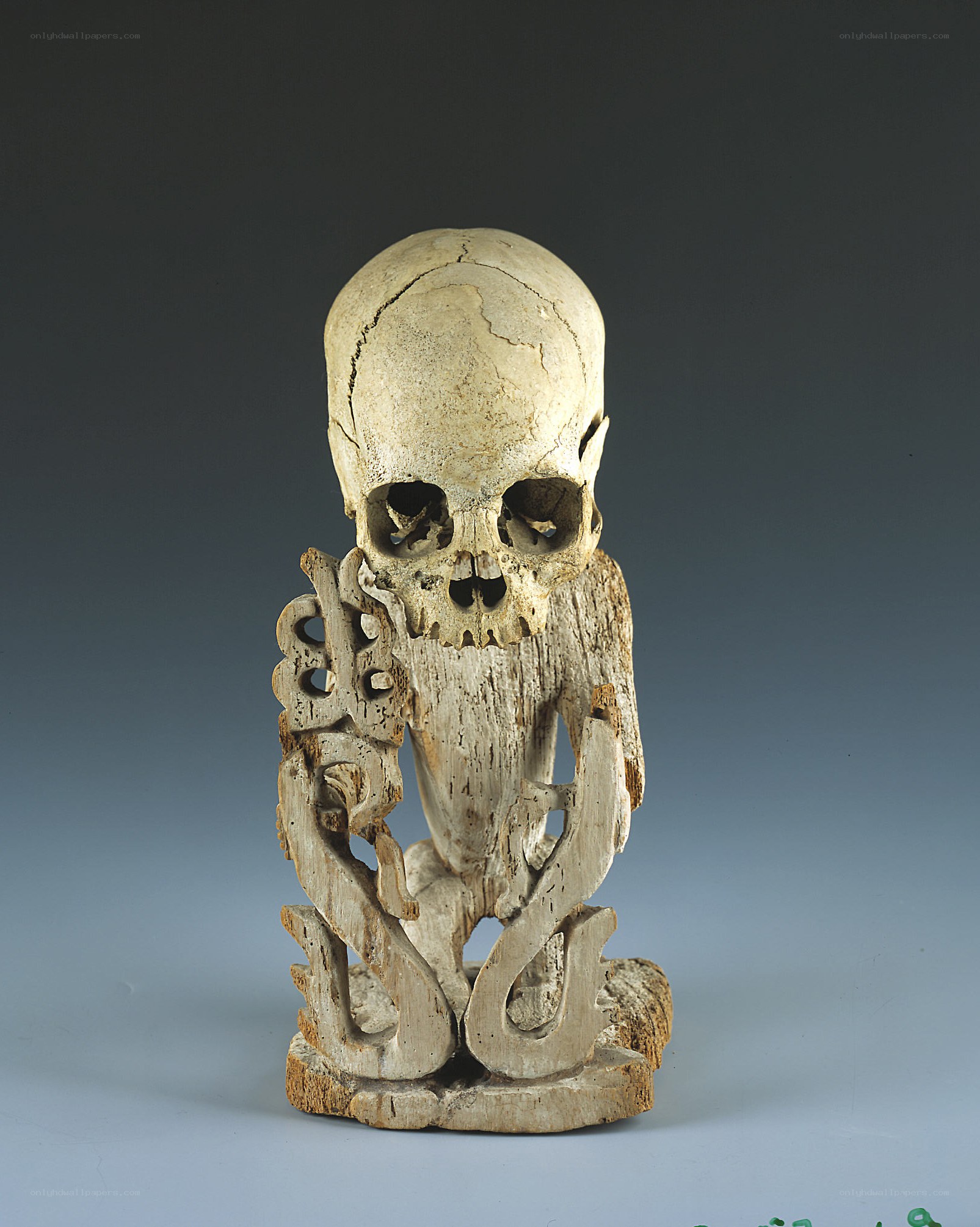 Carved skull figure