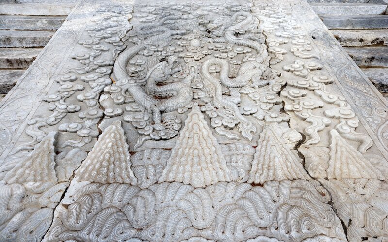 Carved stone dragon panel