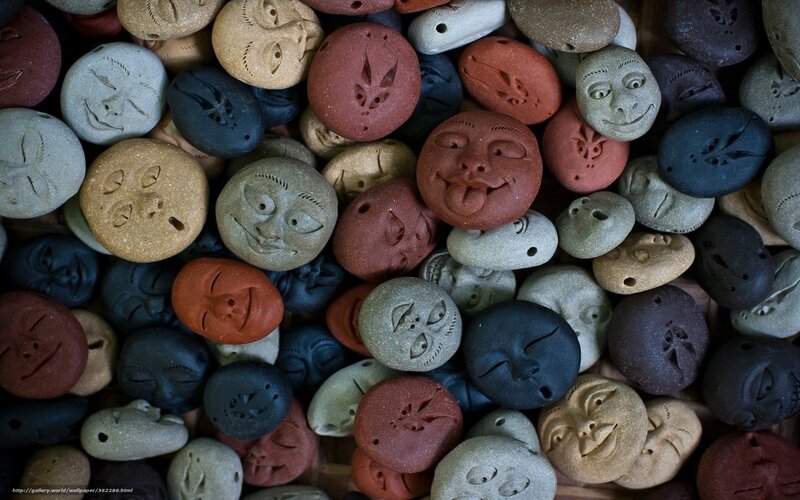 Carved Stone Faces — Brown, Neutral
