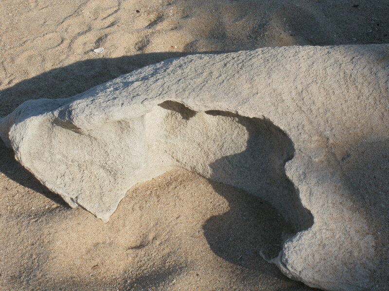 Carved Stone in Sand