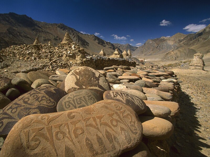 Carved stones in mountain valley