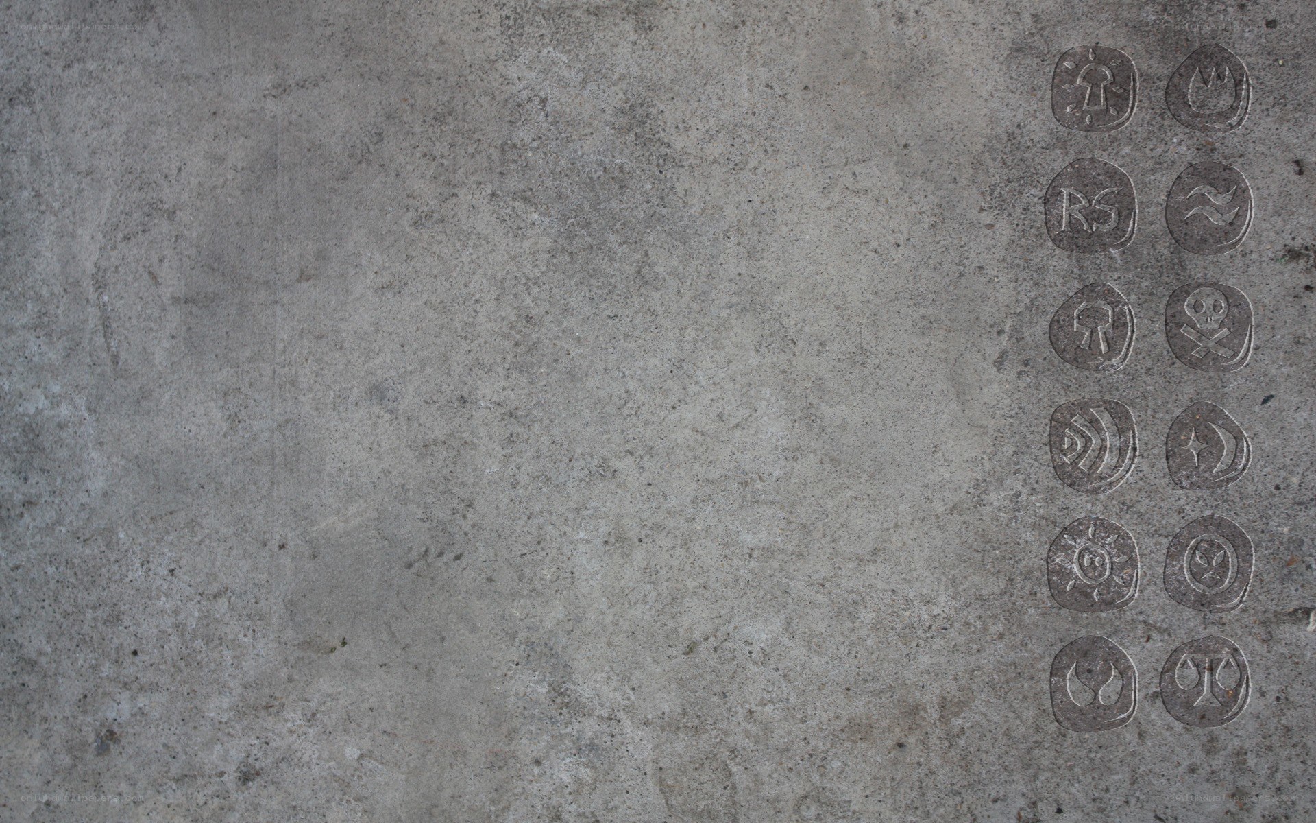 carved symbols on stone wall