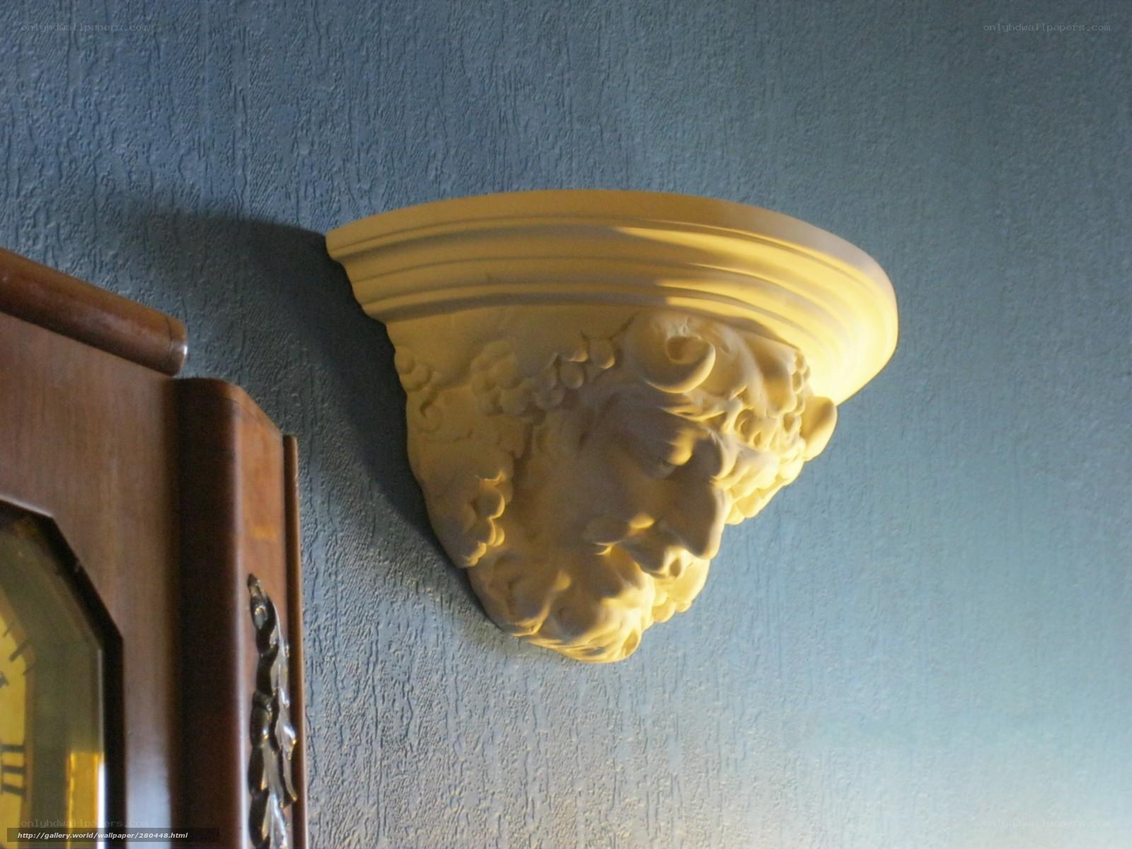 carved wall bracket with face
