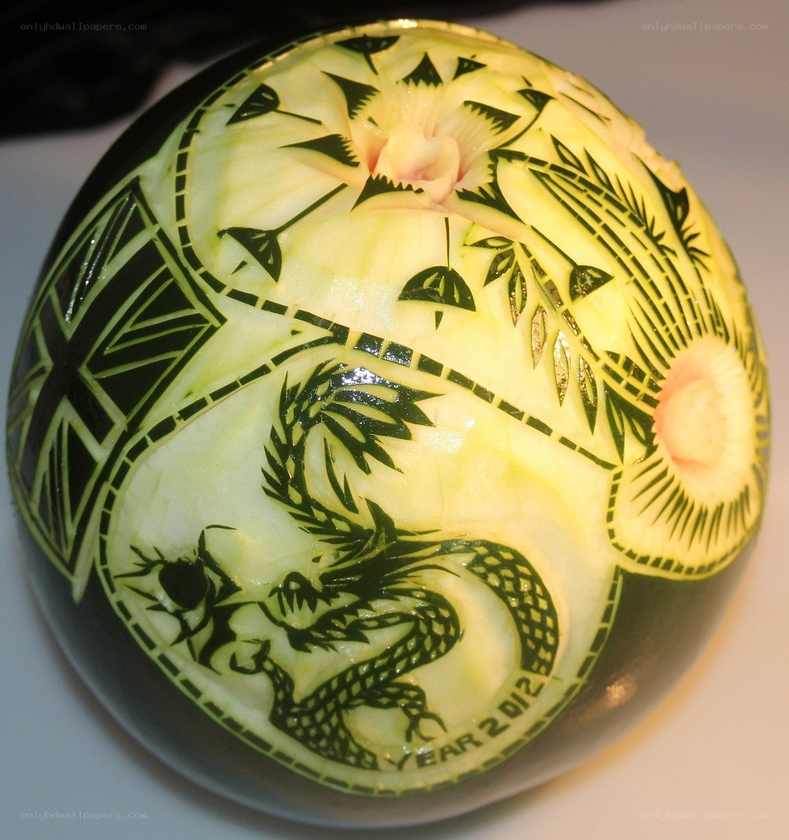 carved watermelon with dragon design