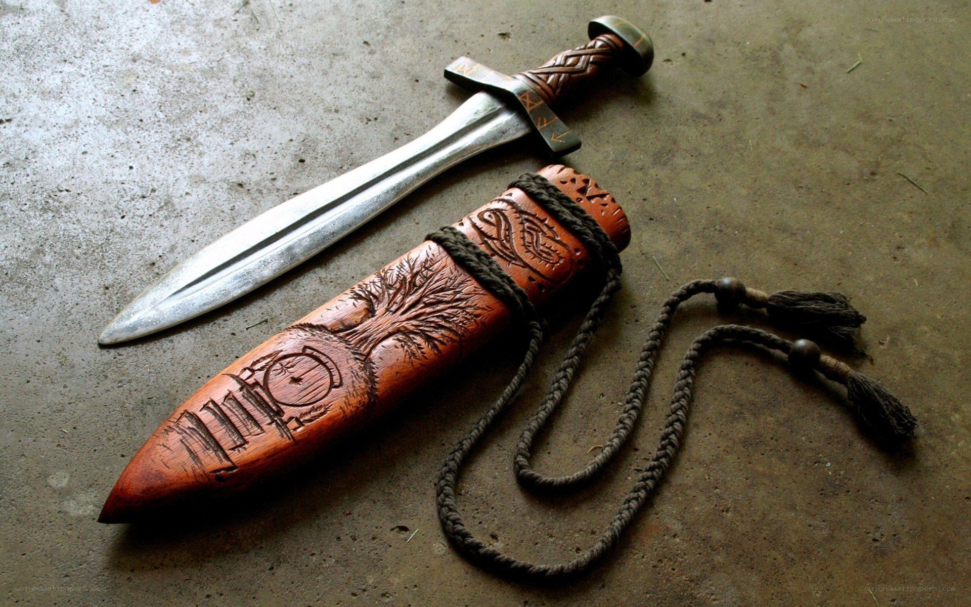 carved wooden dagger sheath