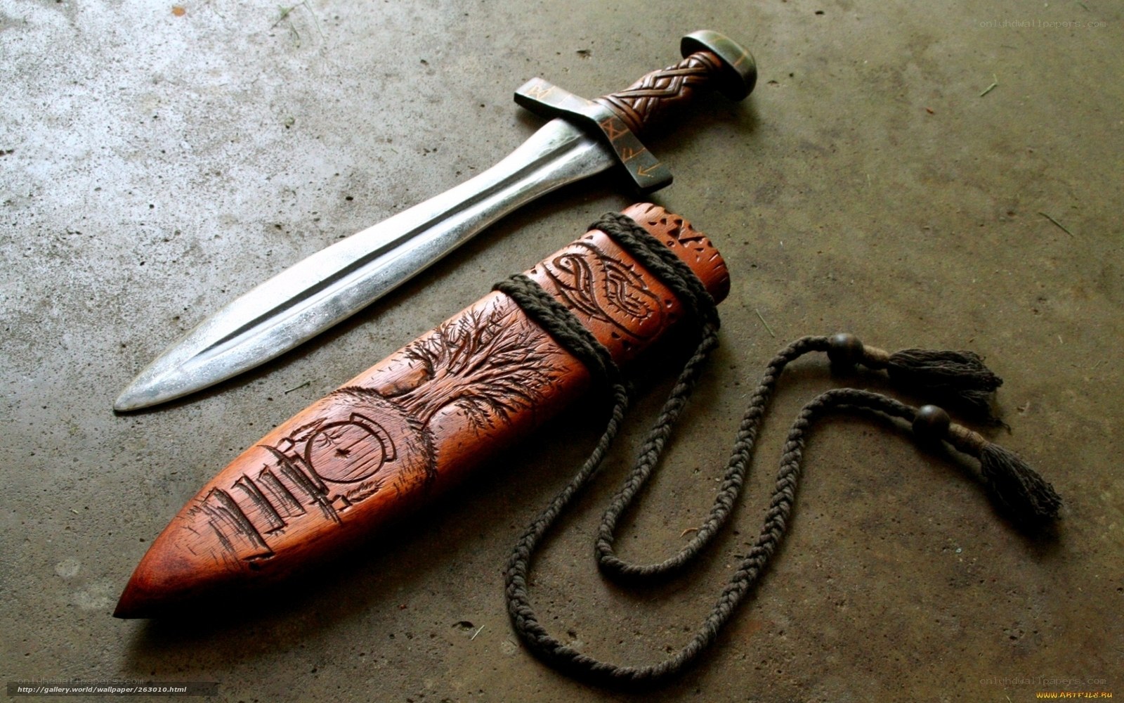 carved wooden dagger sheath
