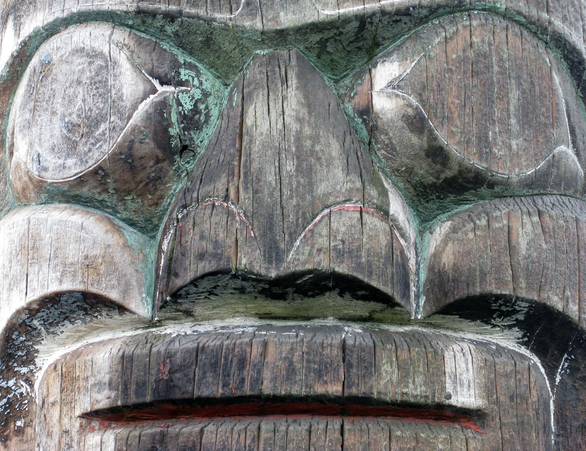 carved wooden face detail