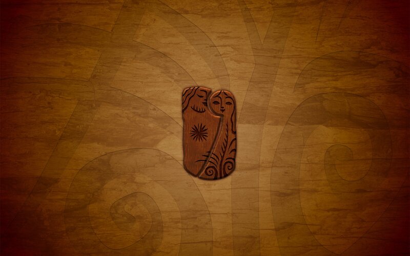 carved wooden figures on wood