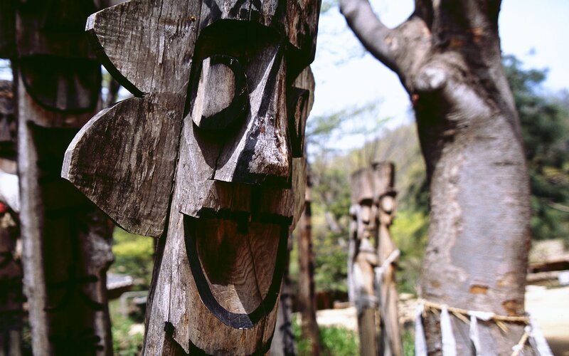 carved wooden totem poles