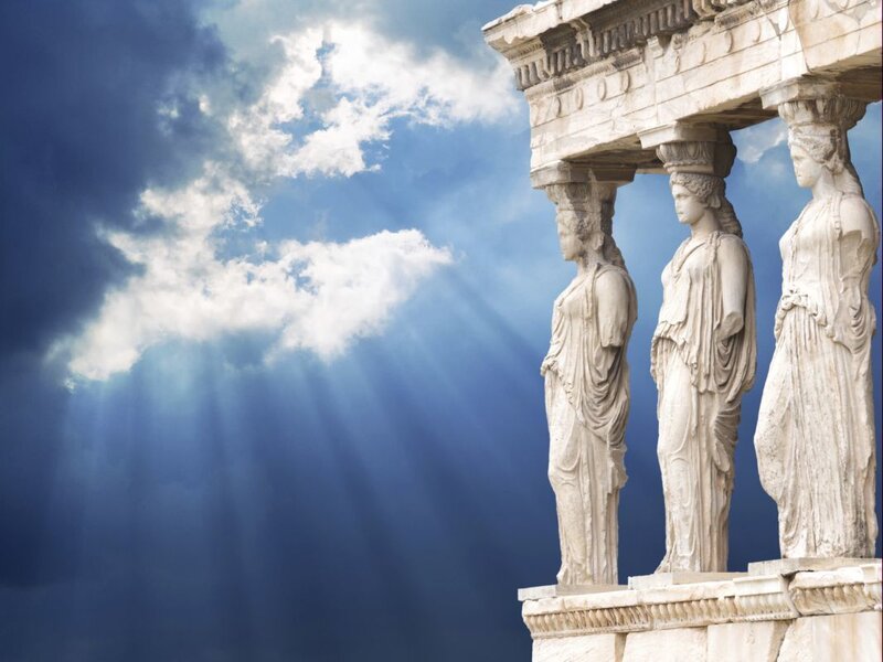 Caryatid statues under sunbeams