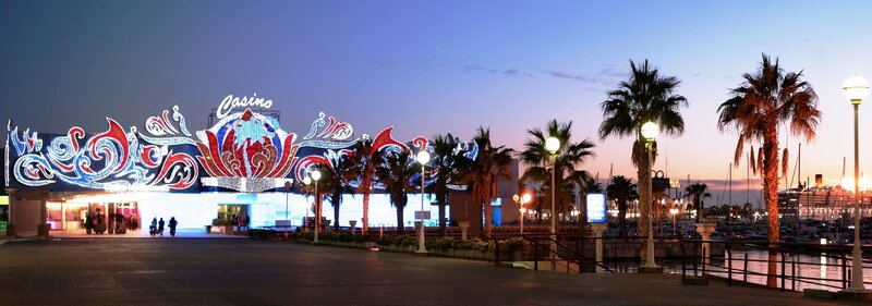 Casino by the harbor at dusk