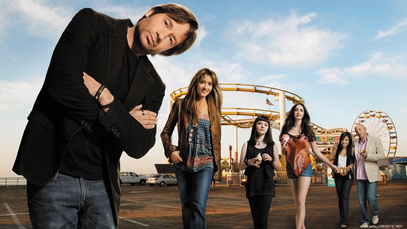 Cast at a boardwalk amusement park