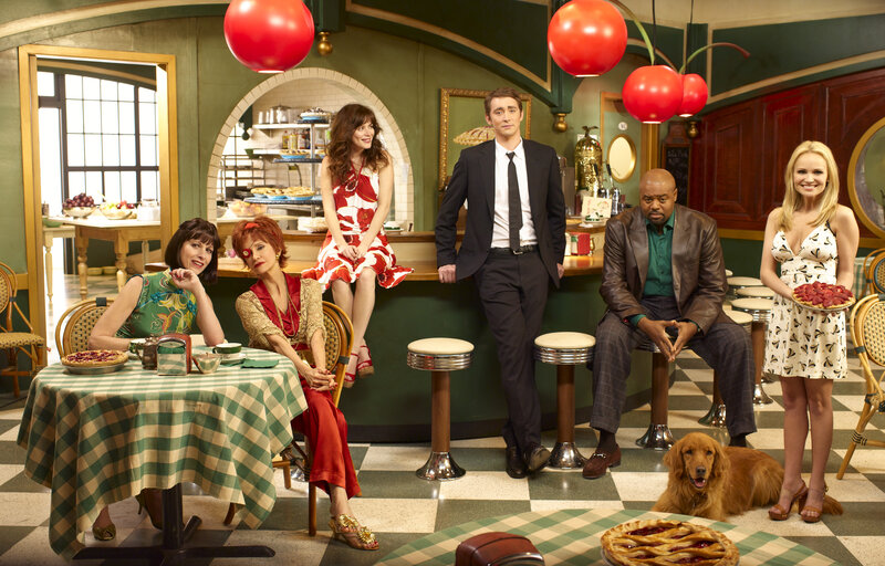 Cast of a retro diner scene