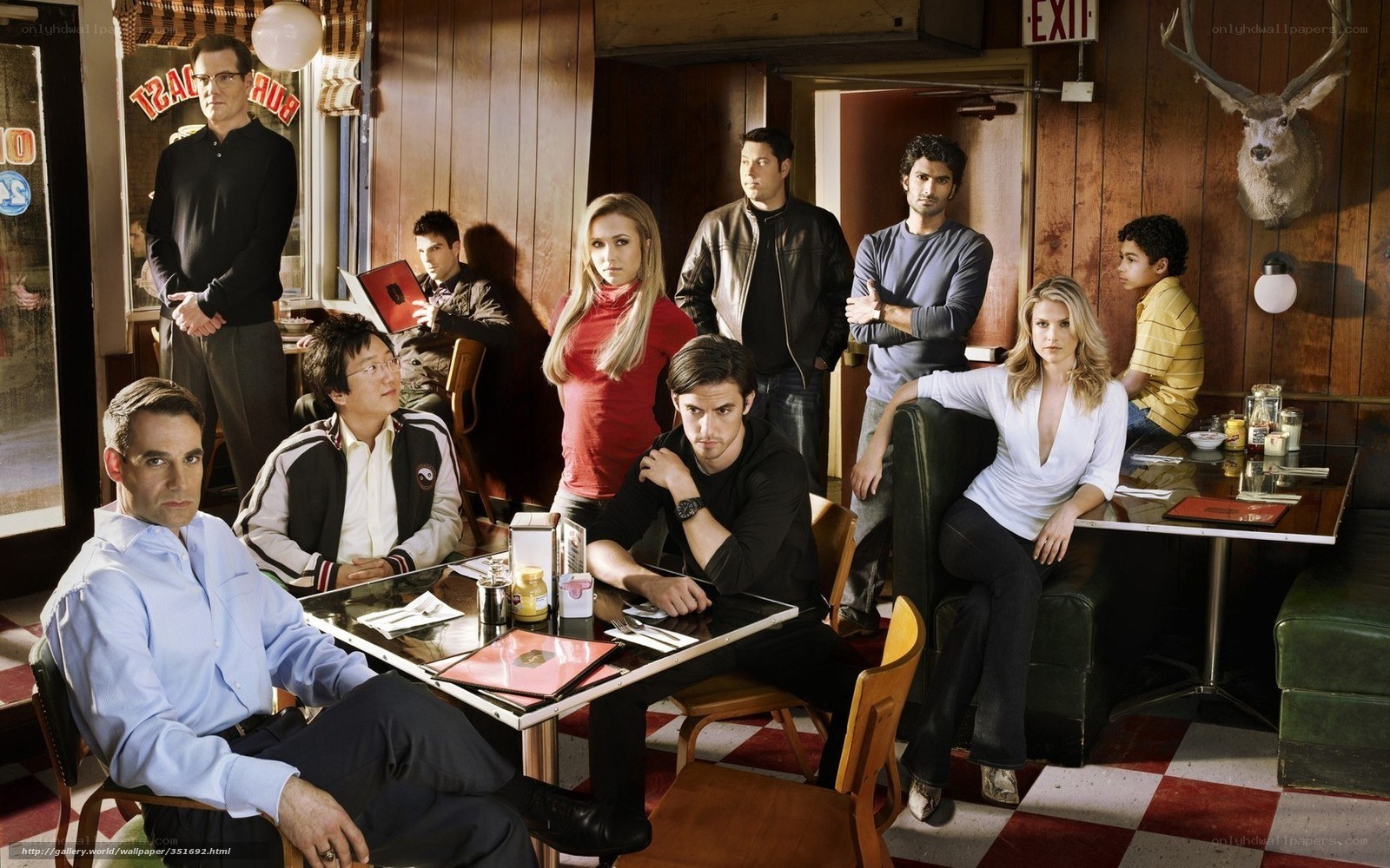 Cast of a TV show in a diner