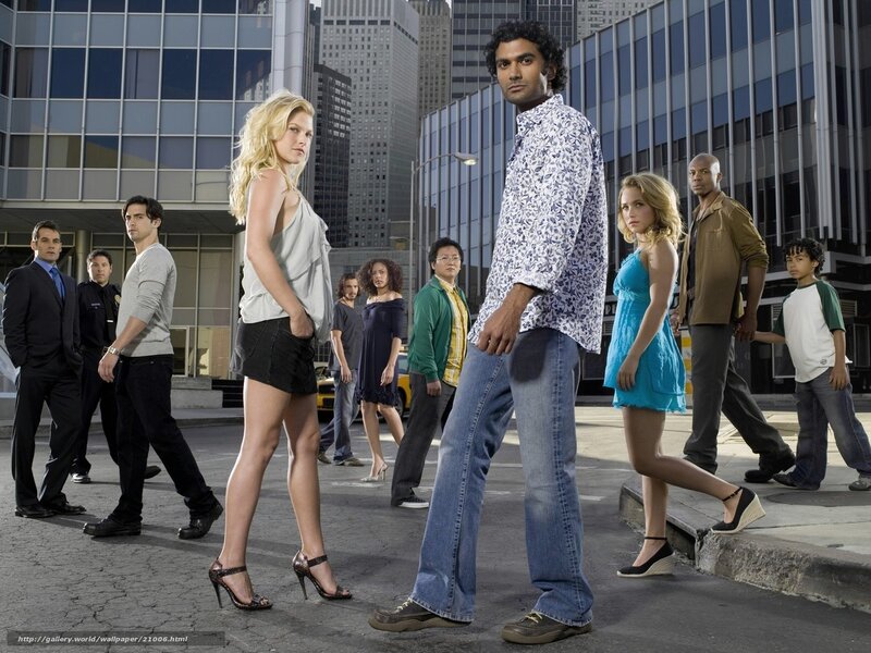 Cast of a TV show on a city street