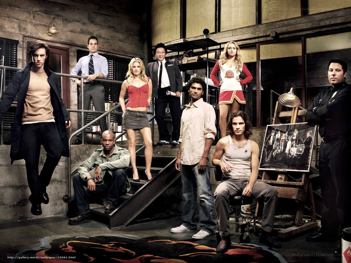 Cast of a TV show on stairs