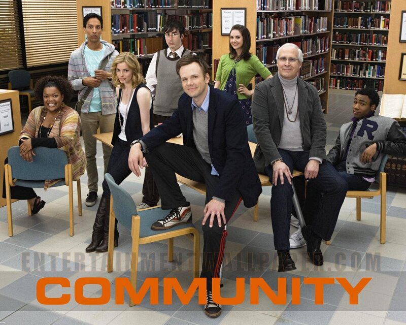 Cast of Community in library