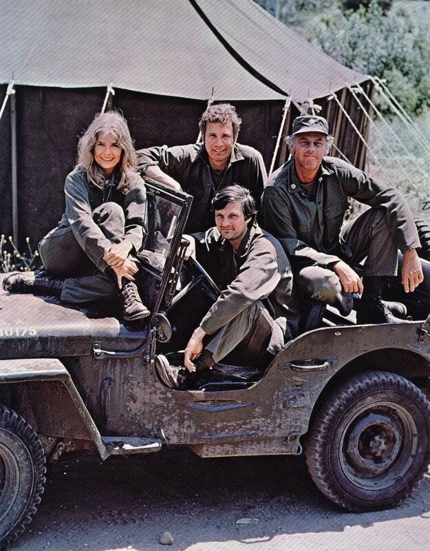Cast of M*A*S*H on jeep