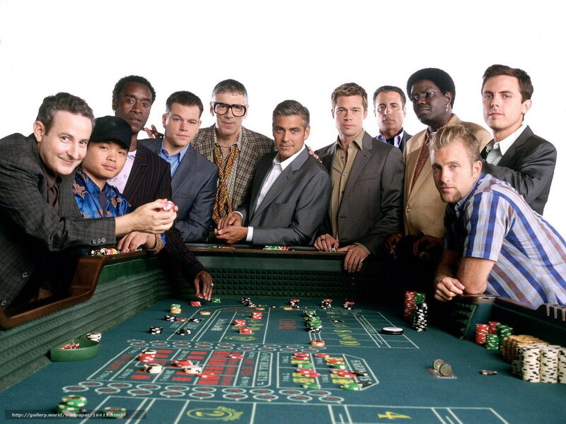 Cast of Ocean's Eleven at a casino table