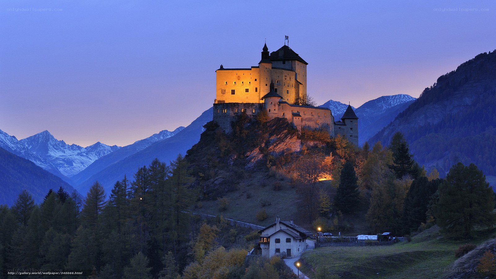 Castle at dusk in the mountains