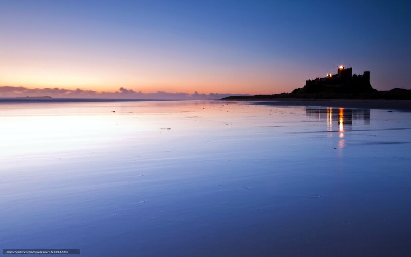 Castle at dusk on a beach