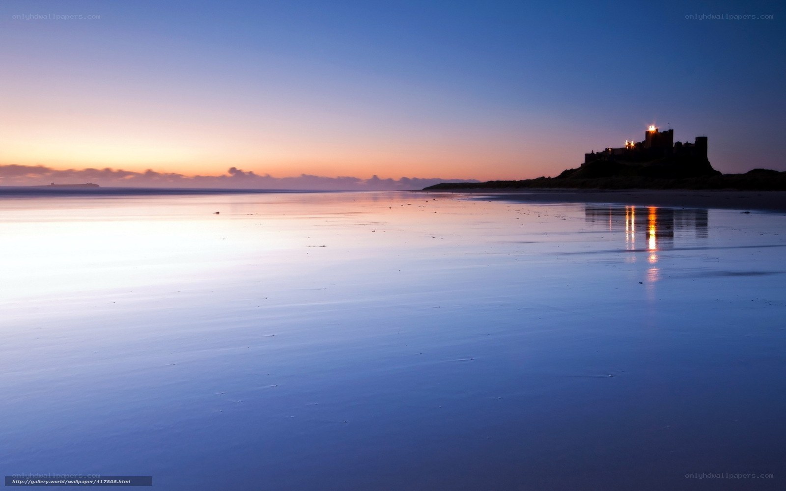 Castle at dusk on a beach