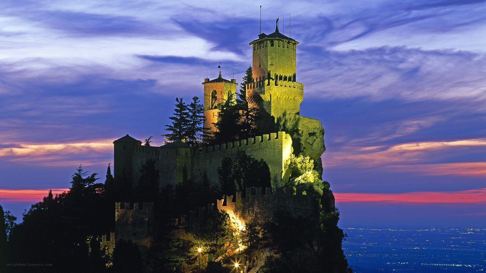castle at dusk on a hill