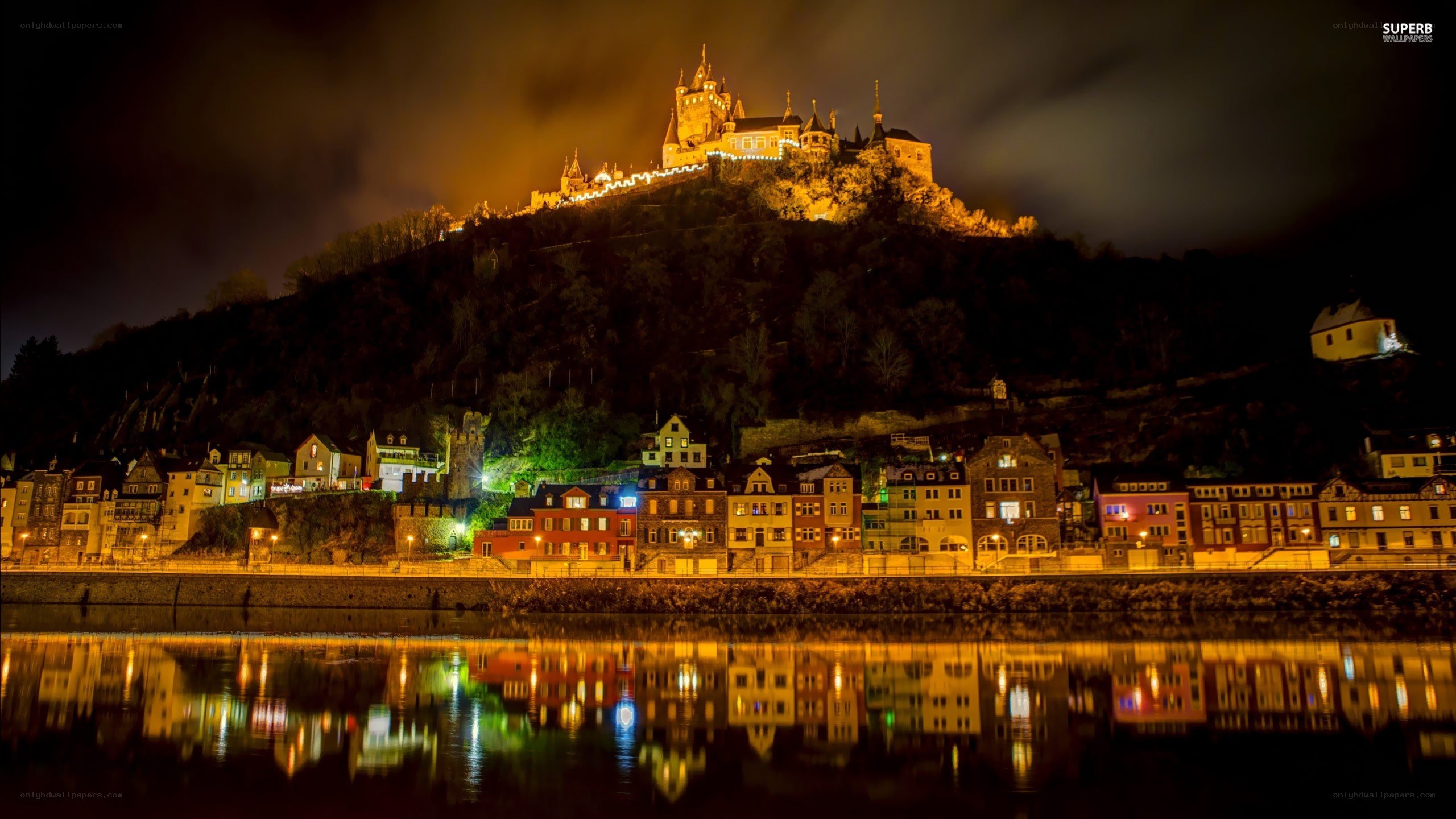 castle at night by the river