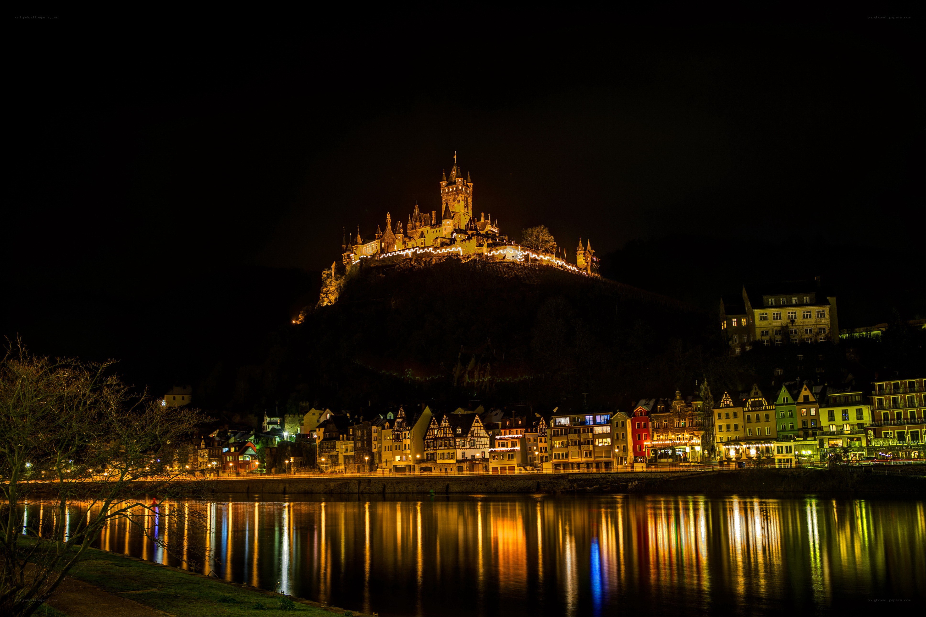 castle at night by the river