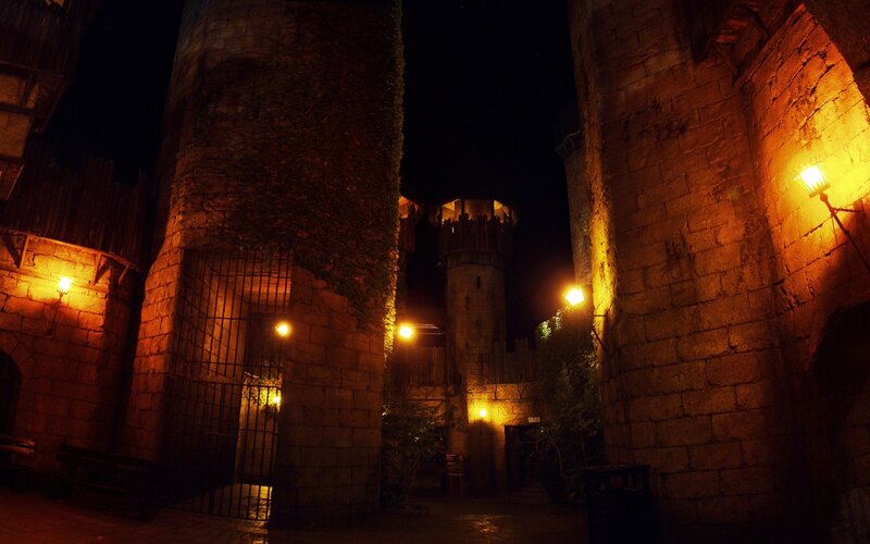 castle at night with lanterns