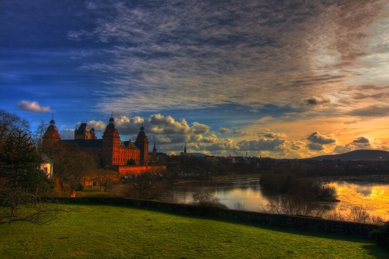 Castle at sunset by the river