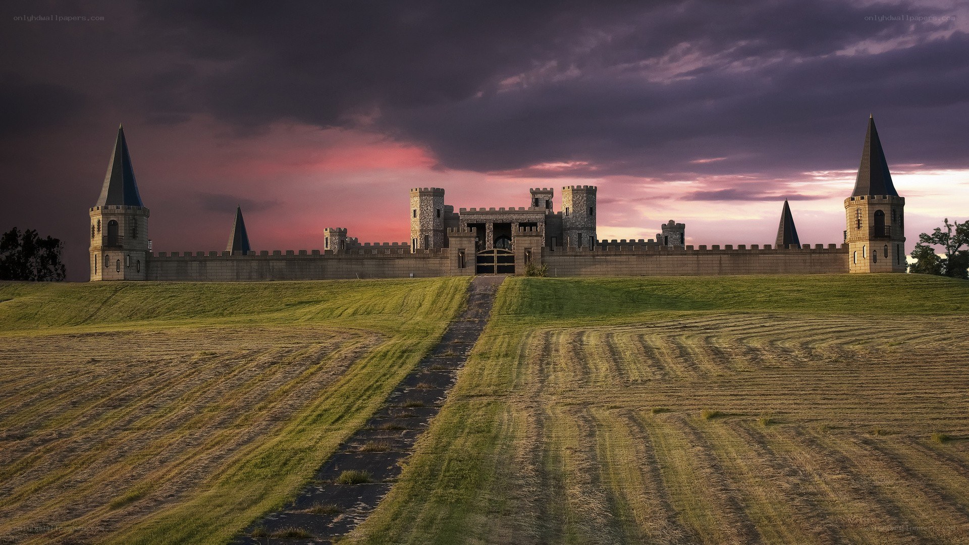 castle at sunset on a hill