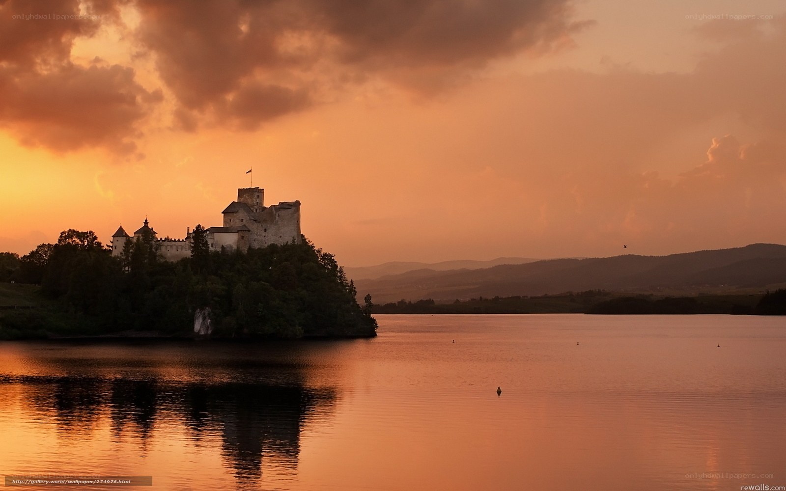 castle at sunset on a lake