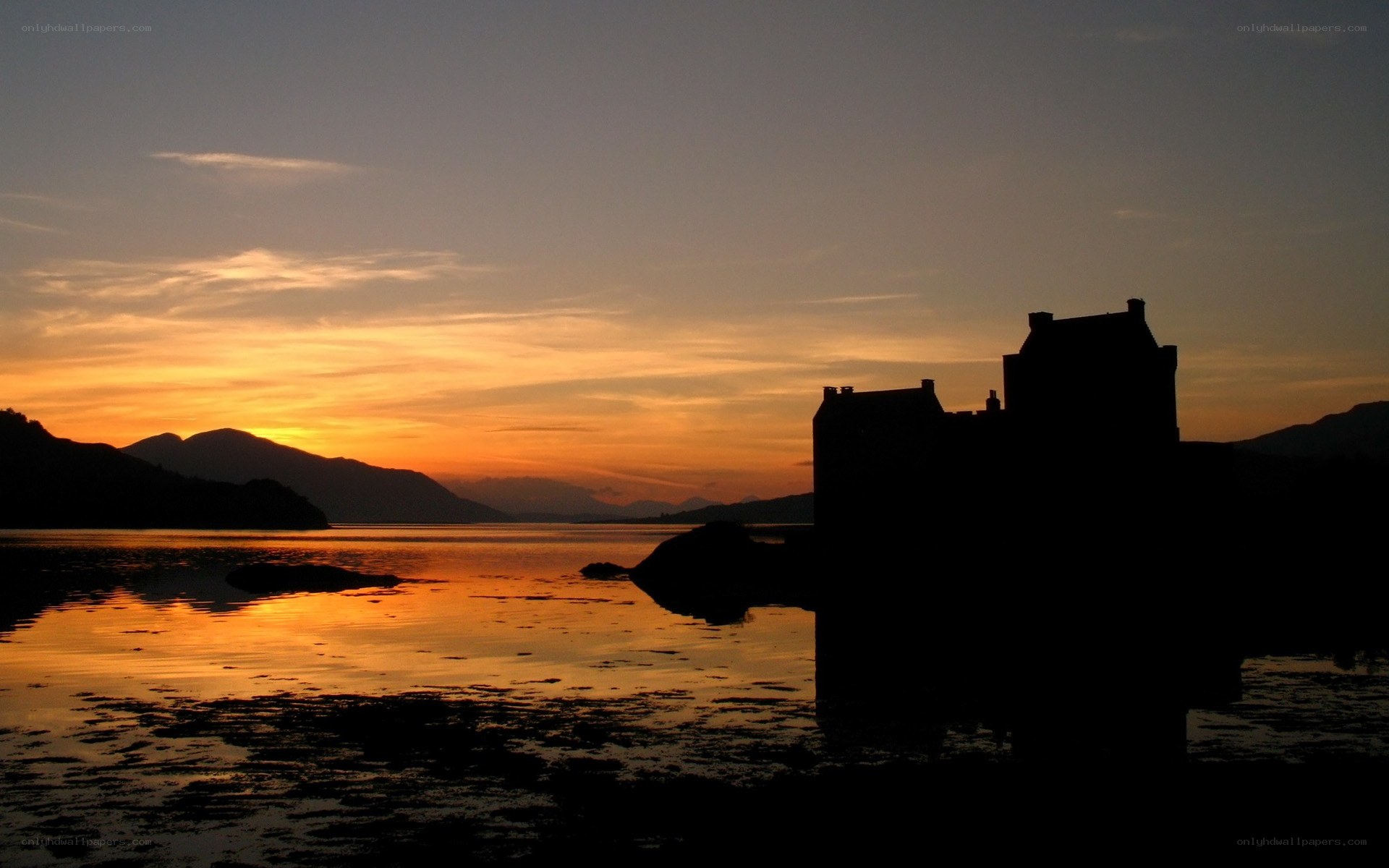 Castle at sunset on a loch