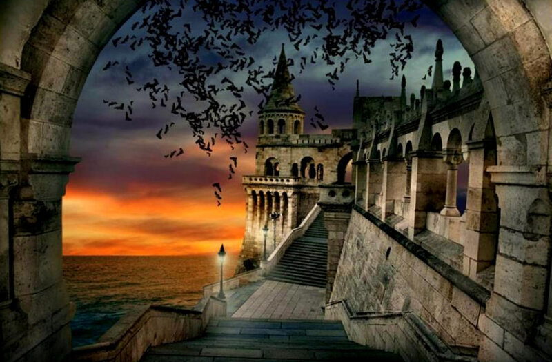 castle at sunset with bats
