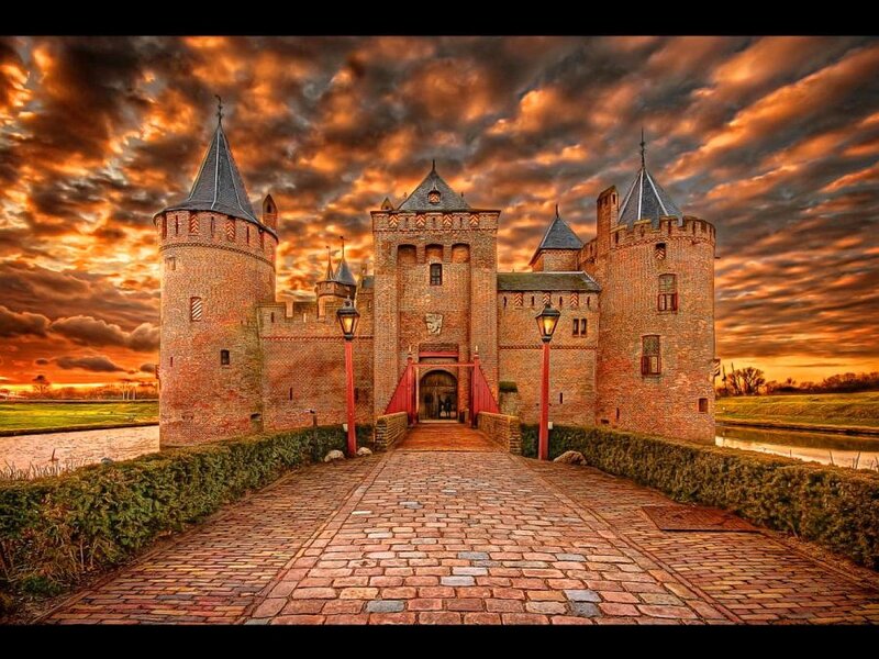 Castle at sunset with dramatic sky