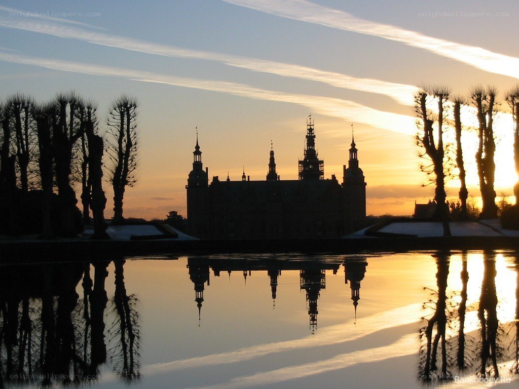 castle at sunset with reflection