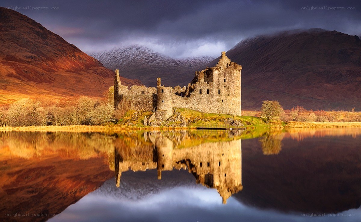 Castle by a lake at sunset