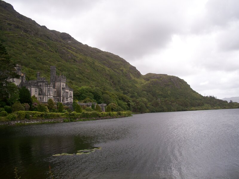 castle by a lake in ireland
