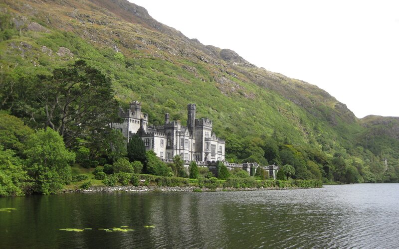 castle by a lake in ireland