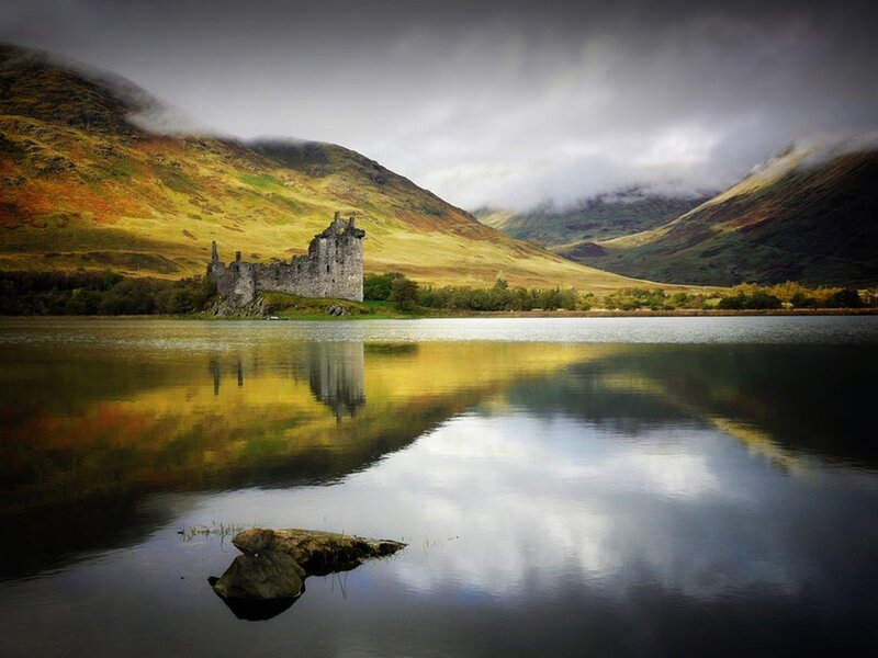 Castle by a lake in Scotland
