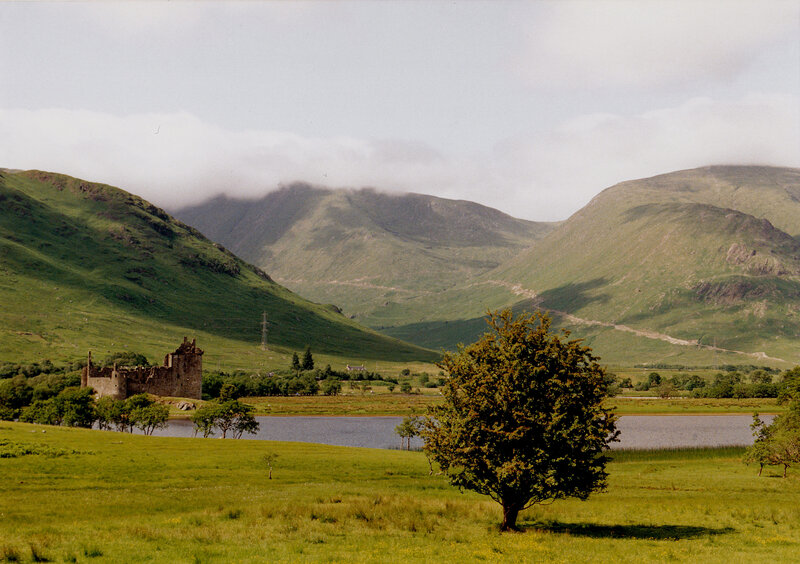 Castle by a lake in the Scottish Highlands